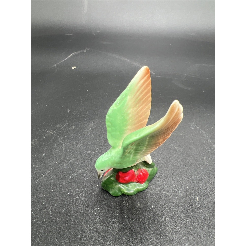 porcelain hummingbird figurine On Barry Base
